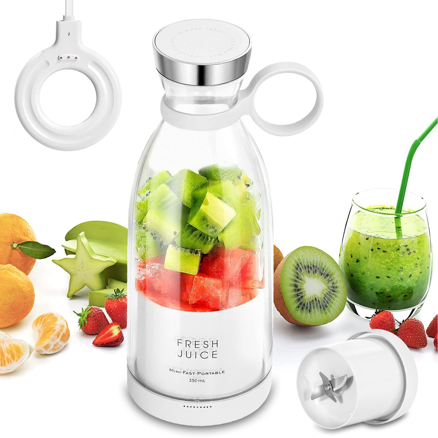 Glass juicer with fruits and a glass of green juice on a white background